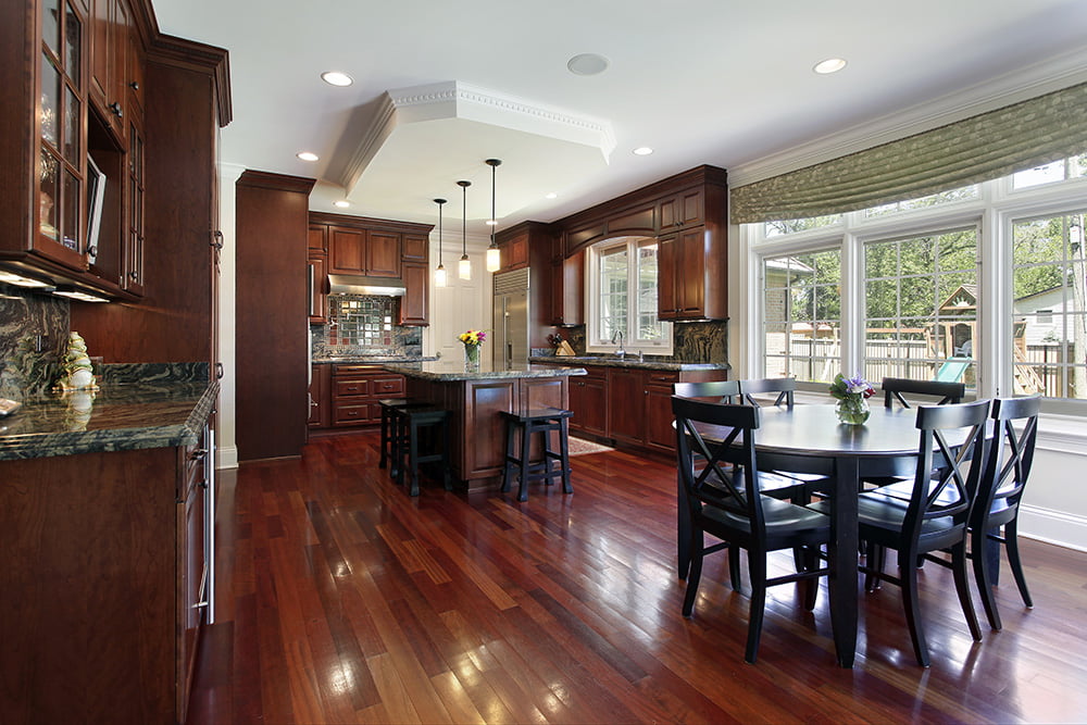 Kitchen in luxury home with cherry wood cabinetry